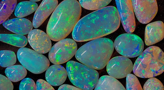 Iridescent Australian Opal gemstone with rainbow-like color play.
