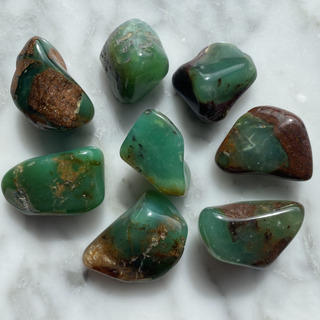 Bright green polished Chrysoprase crystal reflecting light and vitality
