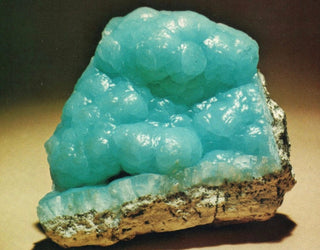 Pale blue Hemimorphite crystal cluster showcasing radiant botryoidal formations.
