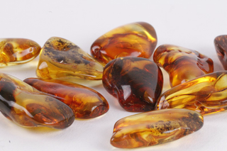 Golden Amber crystal glowing with warmth and protective energy