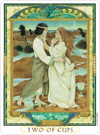 Two people embracing with a scenic background, framed as 'Two of Cups' from a tarot card.
