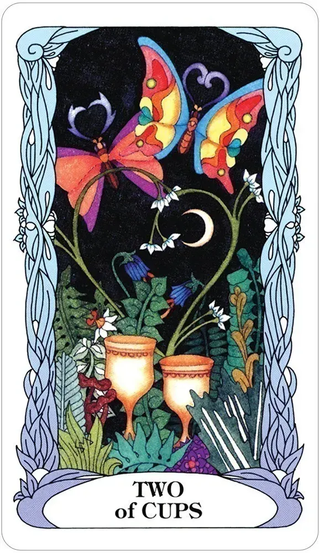 Card featuring two colorful butterflies and two pots with plants, labeled 'Two of Cups'.