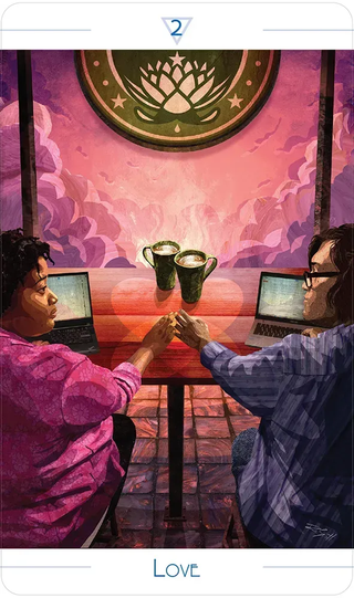 Two people sitting at a table with laptops, holding hands, in a warm, intimate setting.